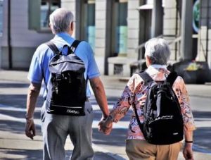 aged couple walking