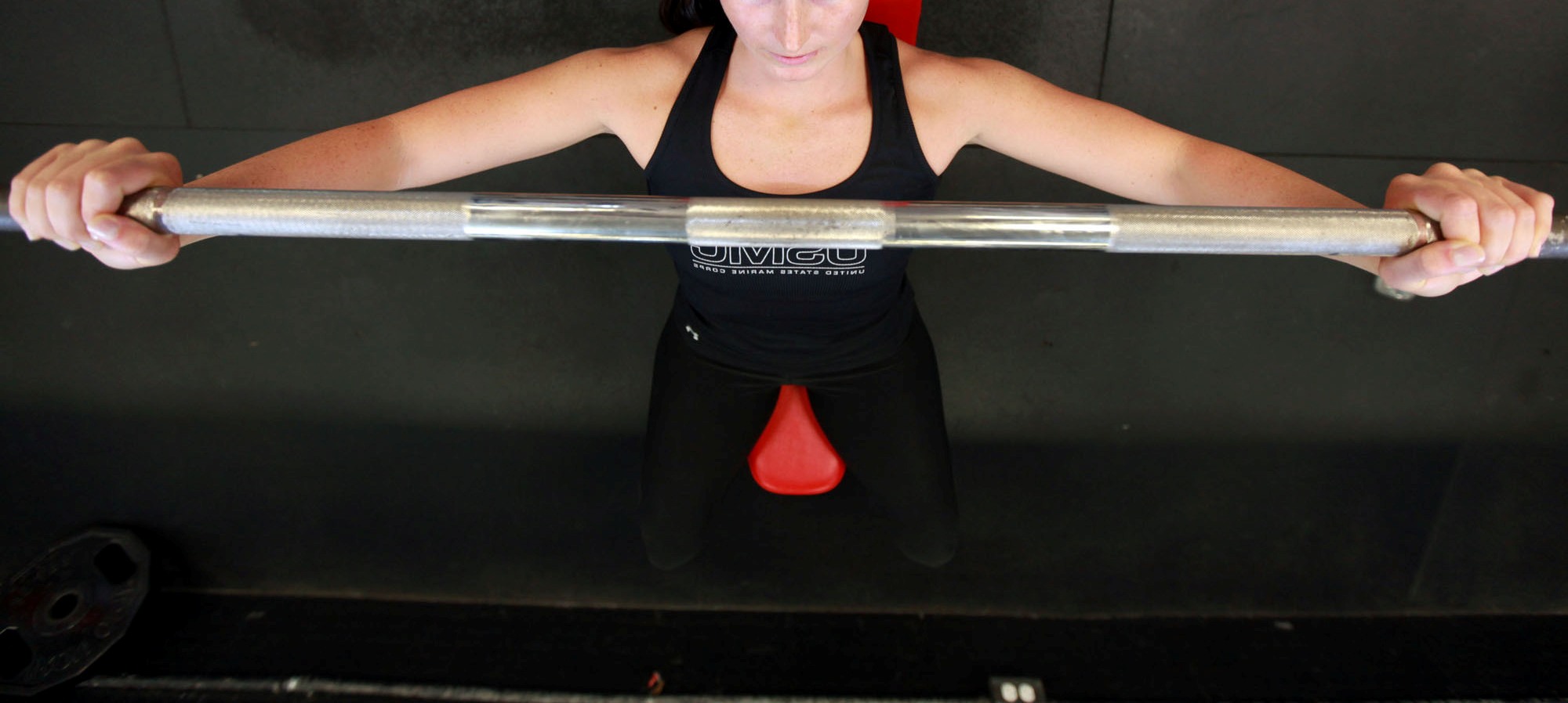 woman using gym equipment
