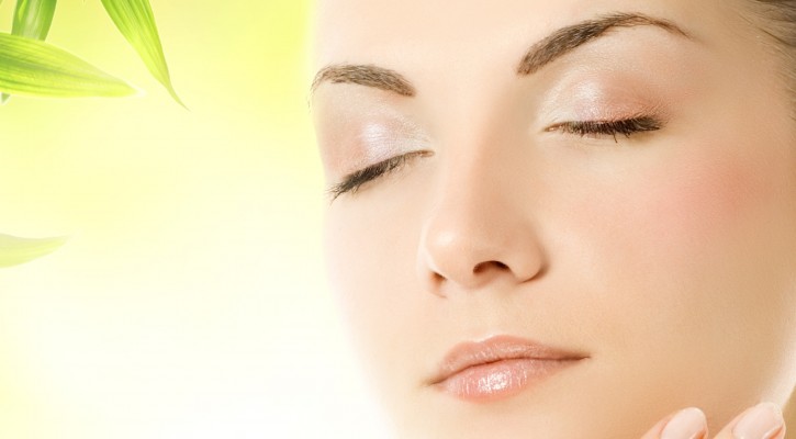 woman closing eyes