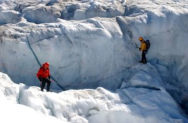 people hiking on ice mountain 