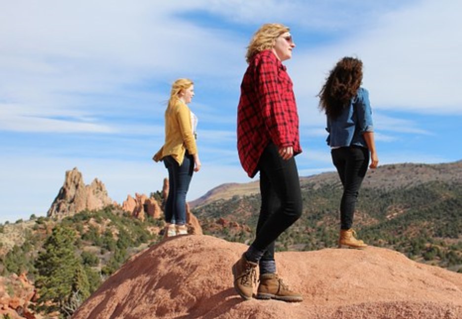 3 girls on hill